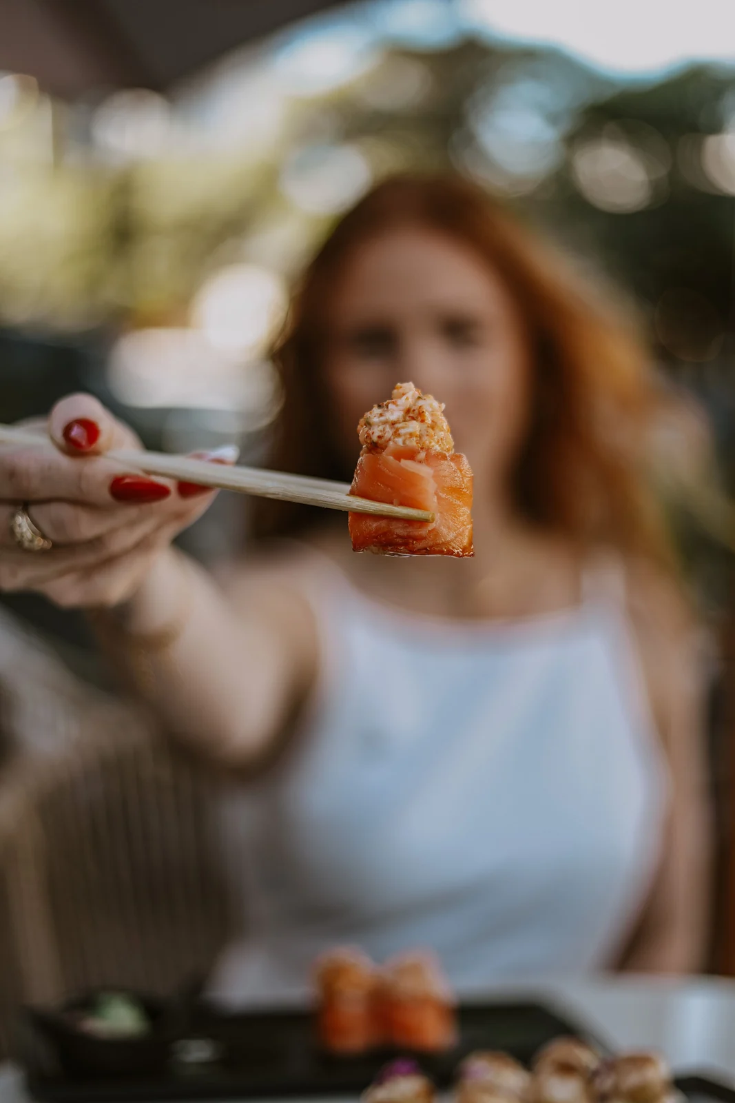 A guest enjoying a signature Sunmer bite
