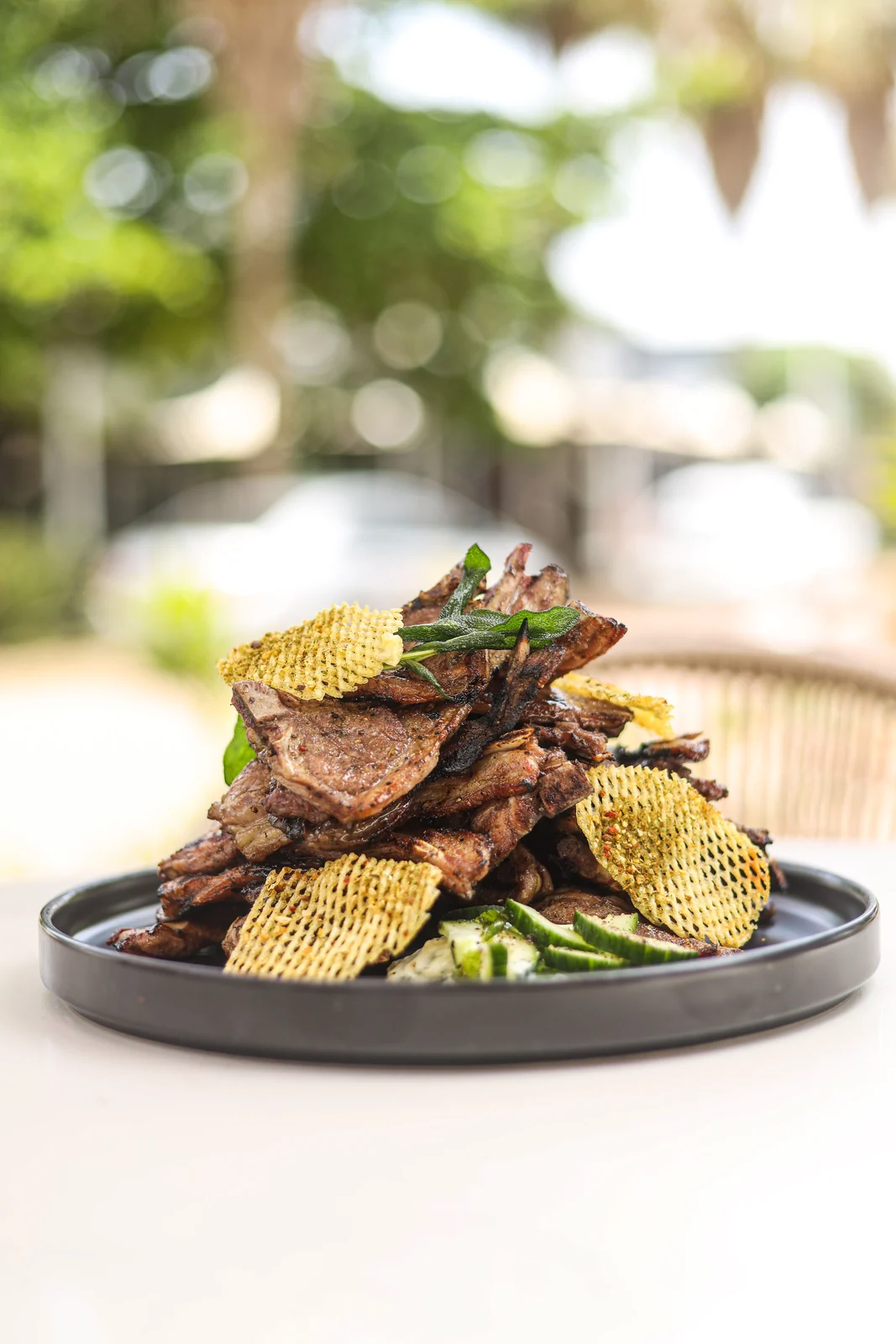 Grilled steak with crisp potatoes and greens